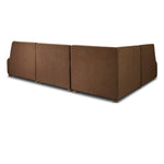Dramatically shaped and tightly tailored, this rounded dining banquette features soft angles all around. Upholstered in a ver