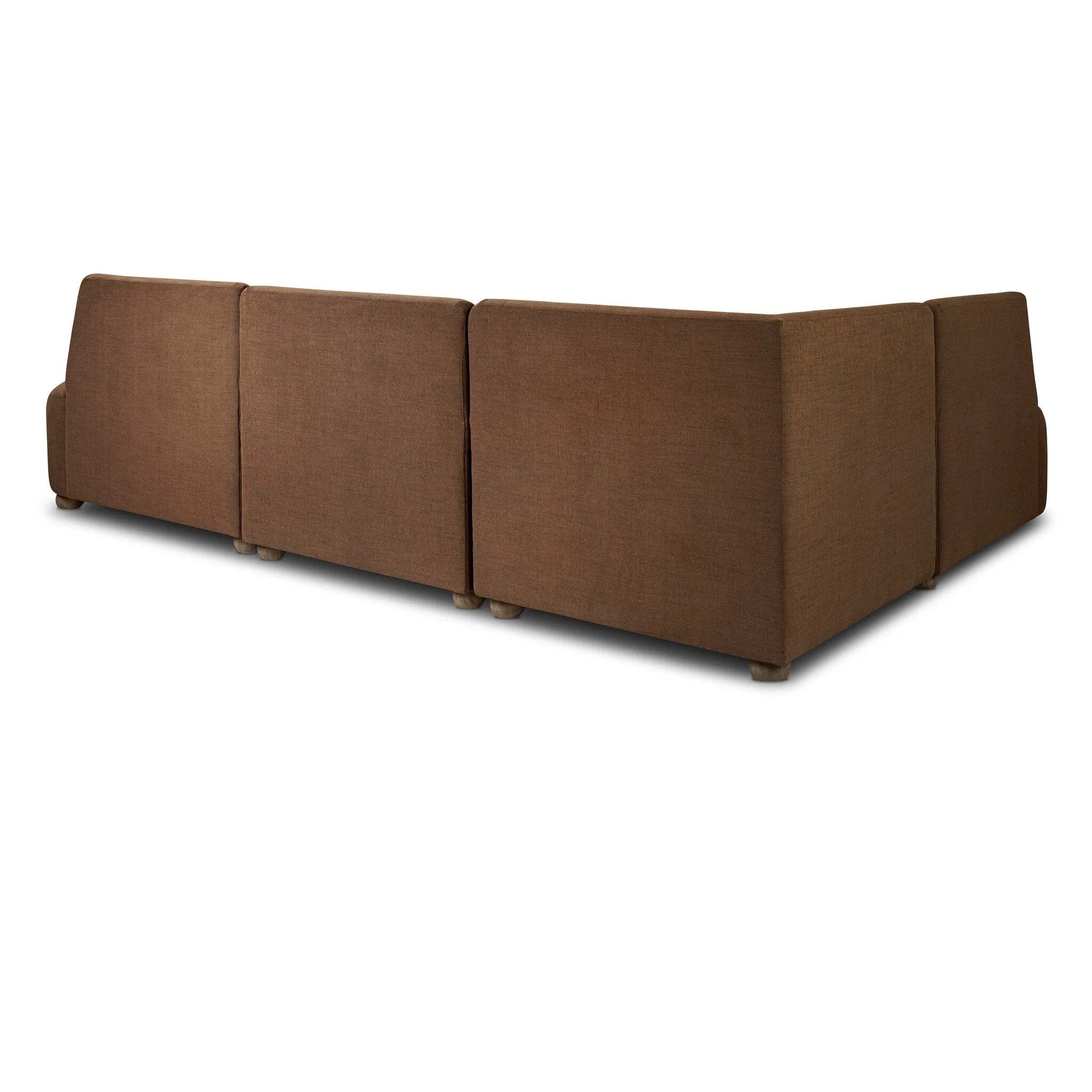 Dramatically shaped and tightly tailored, this rounded dining banquette features soft angles all around. Upholstered in a ver