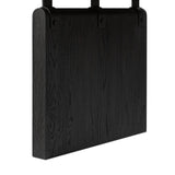 Bring a beautifully contoured look to your workspace with a desk inspired by Italian postmodernism. Connected by iron brackets, a dual-panel base supports a spacious tabletop of worn black oak, crafting a float-like look. Four drawers keep frequently used items within reach Amethyst Home provides interior design, new home construction design consulting, vintage area rugs, and lighting in the Portland metro area.