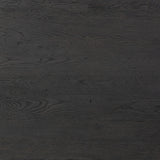 Bring a beautifully contoured look to your workspace with a desk inspired by Italian postmodernism. Connected by iron brackets, a dual-panel base supports a spacious tabletop of worn black oak, crafting a float-like look. Four drawers keep frequently used items within reach Amethyst Home provides interior design, new home construction design consulting, vintage area rugs, and lighting in the Seattle metro area.