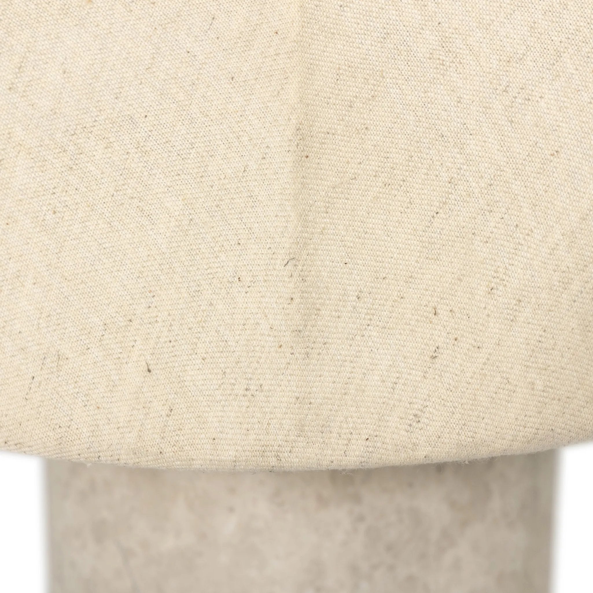 Sculpted Italian taupe marble forms the cylindrical base of this substantial-feeling lamp, topped with a flax-linen dome shade. Fixed with metal boning interior and a brass cylinder finial Amethyst Home provides interior design, new home construction design consulting, vintage area rugs, and lighting in the San Diego metro area.