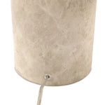Sculpted Italian taupe marble forms the cylindrical base of this substantial-feeling lamp, topped with a flax-linen dome shade. Fixed with metal boning interior and a brass cylinder finial Amethyst Home provides interior design, new home construction design consulting, vintage area rugs, and lighting in the Seattle metro area.