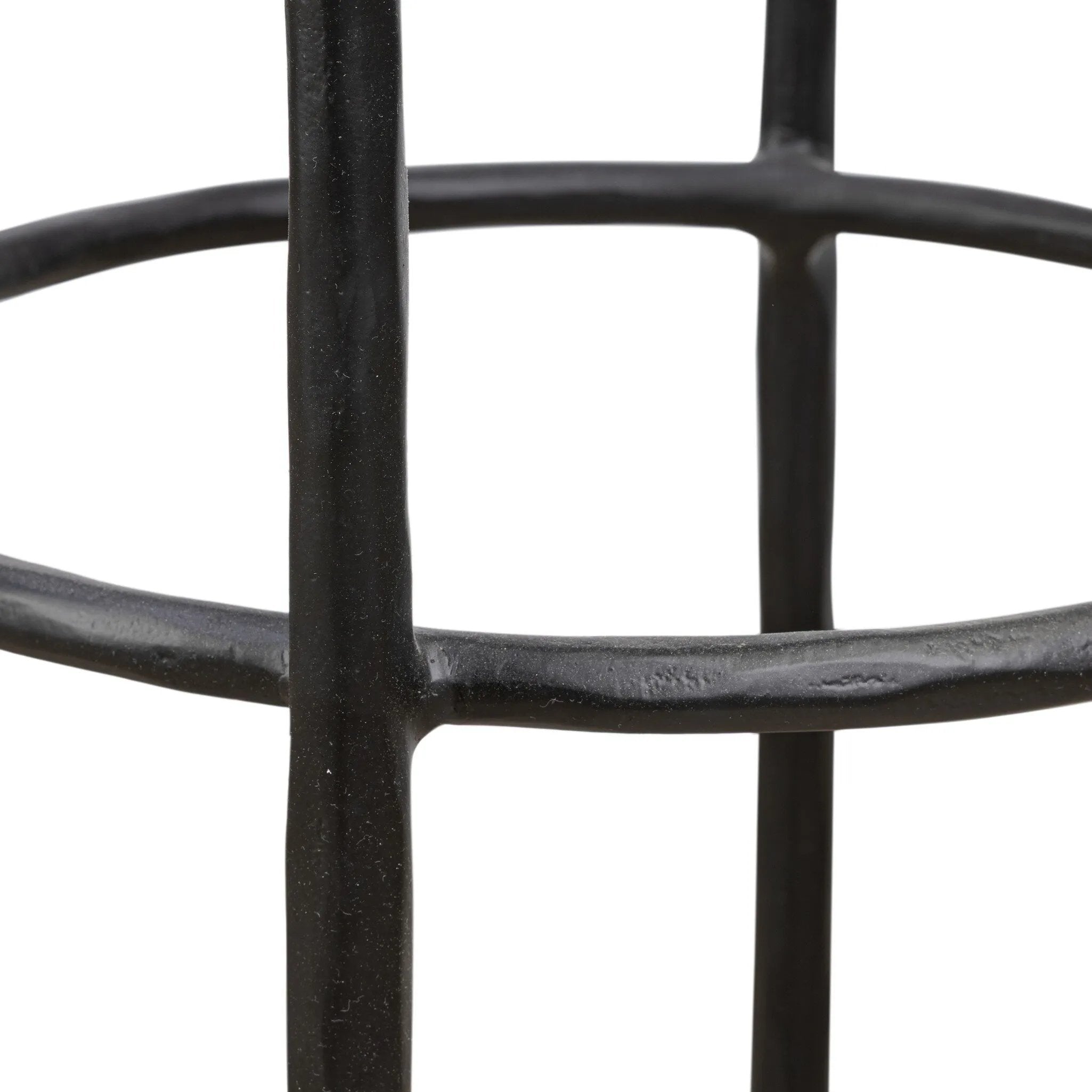 Contrasting materials come together to create an elevated counter stool. Designed with tapered cast iron legs and a solid oak