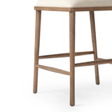 Featuring Colter Antwerp Natural Counter Stool by Four Hands at Amethyst Home. Made from solid ash with an amber finish, this versatile counter stool pairs an airy back with tapered spindles, for a simple, inviting look. A fixed upholstered seat of high-performance fabric adds a smart, comfortable touch. Steam regularly for a crisper fabric look. Performanc. Amethyst Home provides interior design, new home construction design consulting, vintage area rugs, and lighting in the San Diego metro area.