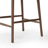 Featuring Colter Chaps Saddle Counter Stool by Four Hands at Amethyst Home. Made from solid ash with a vintage finish, this versatile counter stool pairs an airy back with tapered spindles, for a simple, inviting look. A fixed upholstered seat of top-grain leather adds a smart, comfortable touch.Overall Dimensions: 20.50"w x 22.75"d x 38.25"hWeight : 13.23 . Amethyst Home provides interior design, new home construction design consulting, vintage area rugs, and lighting in the Charlotte metro area.
