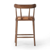 Featuring Colter Chaps Saddle Counter Stool by Four Hands at Amethyst Home. Made from solid ash with a vintage finish, this versatile counter stool pairs an airy back with tapered spindles, for a simple, inviting look. A fixed upholstered seat of top-grain leather adds a smart, comfortable touch.Overall Dimensions: 20.50"w x 22.75"d x 38.25"hWeight : 13.23 lbsM. Amethyst Home provides interior design, new home construction design consulting, vintage area rugs, and lighting in the Omaha metro area.