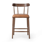 Featuring Colter Chaps Saddle Counter Stool by Four Hands at Amethyst Home. Made from solid ash with a vintage finish, this versatile counter stool pairs an airy back with tapered spindles, for a simple, inviting look. A fixed upholstered seat of top-grain leather adds a smart, comfortable touch.Overall Dimensions: 20.50"w x 22.75"d x 38.25"hWeight : 1. Amethyst Home provides interior design, new home construction design consulting, vintage area rugs, and lighting in the Salt Lake City metro area.
