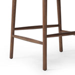 Featuring Colter Chaps Saddle Counter Stool by Four Hands at Amethyst Home. Made from solid ash with a vintage finish, this versatile counter stool pairs an airy back with tapered spindles, for a simple, inviting look. A fixed upholstered seat of top-grain leather adds a smart, comfortable touch.Overall Dimensions: 20.50"w x 22.75"d x 38.25"hWeight : 13.23 . Amethyst Home provides interior design, new home construction design consulting, vintage area rugs, and lighting in the San Diego metro area.