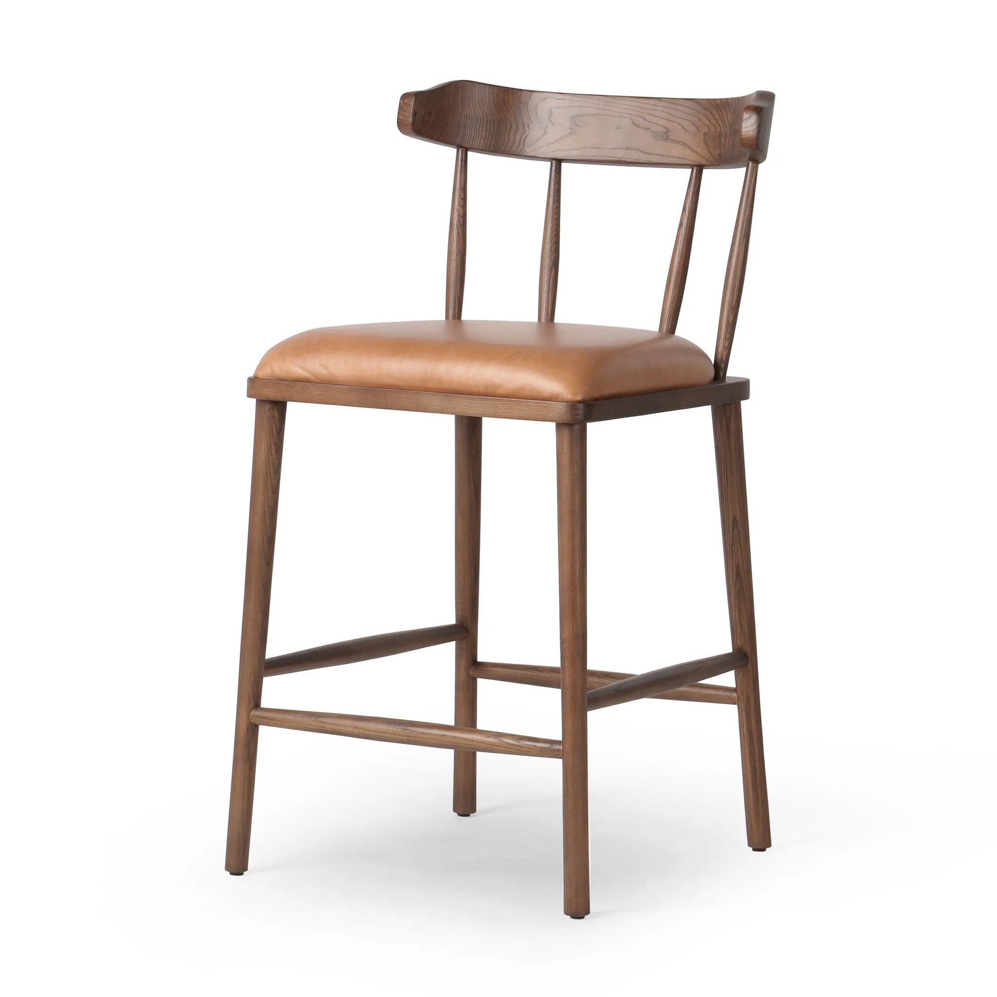 Featuring Colter Chaps Saddle Counter Stool by Four Hands at Amethyst Home. Made from solid ash with a vintage finish, this versatile counter stool pairs an airy back with tapered spindles, for a simple, inviting look. A fixed upholstered seat of top-grain leather adds a smart, comfortable touch.Overall Dimensions: 20.50"w x 22.75"d x 38.25"hWeight : 13.23. Amethyst Home provides interior design, new home construction design consulting, vintage area rugs, and lighting in the Washington metro area.
