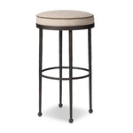 Featuring Corinne Alcala Taupe Bar + Counter Stool by Four Hands at Amethyst Home. Hammered iron legs with ball-shaped foot details elevate this simply shaped bar stool. A round, cushioned seat upholstered in performance fabric offers a clean, inviting look. Performance fabrics are specially created to withstand spills, stains, high traffic and wear, ensuring . Amethyst Home provides interior design, new home construction design consulting, vintage area rugs, and lighting in the Austin metro area.