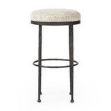 Featuring Corinne Ivan Stone Bar + Counter Stool by Four Hands at Amethyst Home. Hammered bronze legs with ball-shaped foot details elevate this simply shaped counter stool. A round, cushioned seat in a heavy boucle-like fabric finishes this counter-height stool's clean, inviting look.BarOverall Dimensions: 17.00"w x 17.00"d x 31.25"hWeight: 32.19 lbsCounte. Amethyst Home provides interior design, new home construction design consulting, vintage area rugs, and lighting in the Charlotte metro area.