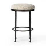 Featuring Corinne Ivan Stone Bar + Counter Stool by Four Hands at Amethyst Home. Hammered bronze legs with ball-shaped foot details elevate this simply shaped counter stool. A round, cushioned seat in a heavy boucle-like fabric finishes this counter-height stool's clean, inviting look.BarOverall Dimensions: 17.00"w x 17.00"d x 31.25"hWeight: 32.19 lbsCounterO. Amethyst Home provides interior design, new home construction design consulting, vintage area rugs, and lighting in the Houston metro area.
