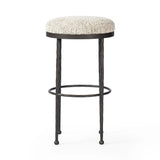 Featuring Corinne Ivan Stone Bar + Counter Stool by Four Hands at Amethyst Home. Hammered bronze legs with ball-shaped foot details elevate this simply shaped counter stool. A round, cushioned seat in a heavy boucle-like fabric finishes this counter-height stool's clean, inviting look.BarOverall Dimensions: 17.00"w x 17.00"d x 31.25"hWeight: 32.19 lbsCoun. Amethyst Home provides interior design, new home construction design consulting, vintage area rugs, and lighting in the Los Angeles metro area.