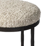 Featuring Corinne Ivan Stone Bar + Counter Stool by Four Hands at Amethyst Home. Hammered bronze legs with ball-shaped foot details elevate this simply shaped counter stool. A round, cushioned seat in a heavy boucle-like fabric finishes this counter-height stool's clean, inviting look.BarOverall Dimensions: 17.00"w x 17.00"d x 31.25"hWeight: 32.19 lbsCounter. Amethyst Home provides interior design, new home construction design consulting, vintage area rugs, and lighting in the Monterey metro area.