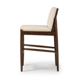 Featuring Costera Antwerp Natural Bar Stool by Four Hands at Amethyst Home. Expertly crafted, the Costera Antwerp Natural Bar Stool seamlessly combines style and functionality. Made with high-quality materials, it offers sturdy and comfortable seating for any space. Available in a natural finish, it adds a touch of elegance to your décor. 
Overall Dimensions: . Amethyst Home provides interior design, new home construction design consulting, vintage area rugs, and lighting in the Dallas metro area.