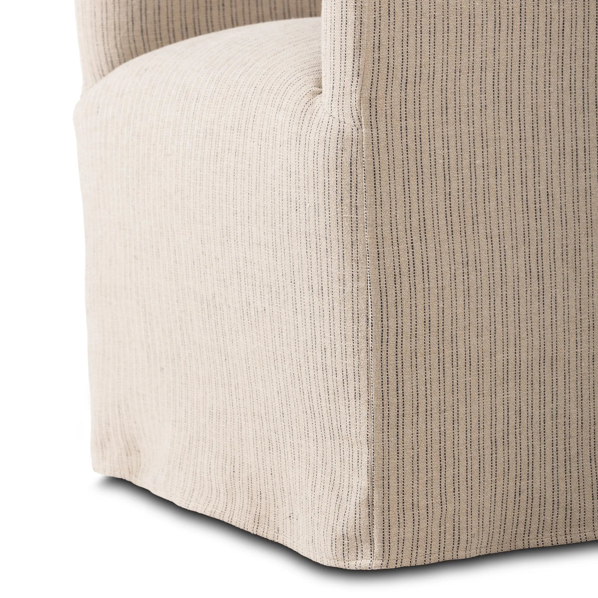 Featuring Cove Laine Navy Dining Chair With Casters by Four Hands at Amethyst Home. A polished form with curved lines and upholstered in a flax/linen blend, this chair brings quiet sophistication to the dining room. Functional casters allow easy movement. This item has limited online distribution and may not be sold on websites without prior approval.Ove. Amethyst Home provides interior design, new home construction design consulting, vintage area rugs, and lighting in the Laguna Beach metro area.