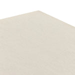 Talk about novelty. Made from painted linen in a light ivory, arched legs soften otherwise clean, modern shaping. Finished in