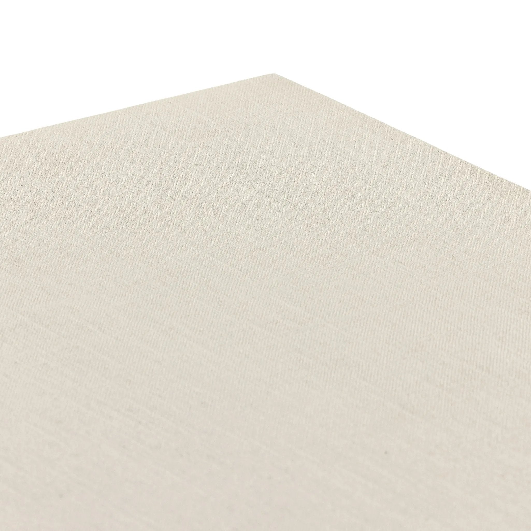 Talk about novelty. Made from painted linen in a light ivory, arched legs soften otherwise clean, modern shaping. Finished in