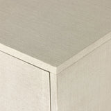 Talk about novelty. Made from painted linen in a light ivory, arched legs soften otherwise clean, modern shaping. Finished in