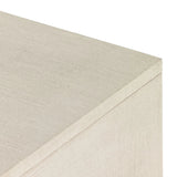 Talk about novelty. Made from painted linen in a light ivory, arched legs soften otherwise clean, modern shaping. Finished in