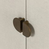 Talk about novelty. Made from painted linen in a light ivory, arched legs soften otherwise clean, modern shaping. Finished in