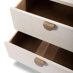 Talk about novelty. Made from painted linen in a light ivory, arched legs soften otherwise clean, modern shaping. Two drawers bring storage to the bedside while half-moon iron hardware adds a hint of art deco style Amethyst Home provides interior design, new home construction design consulting, vintage area rugs, and lighting in the Laguna Beach metro area.