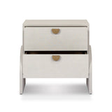 Talk about novelty. Made from painted linen in a light ivory, arched legs soften otherwise clean, modern shaping. Two drawers bring storage to the bedside while half-moon iron hardware adds a hint of art deco style Amethyst Home provides interior design, new home construction design consulting, vintage area rugs, and lighting in the Miami metro area.