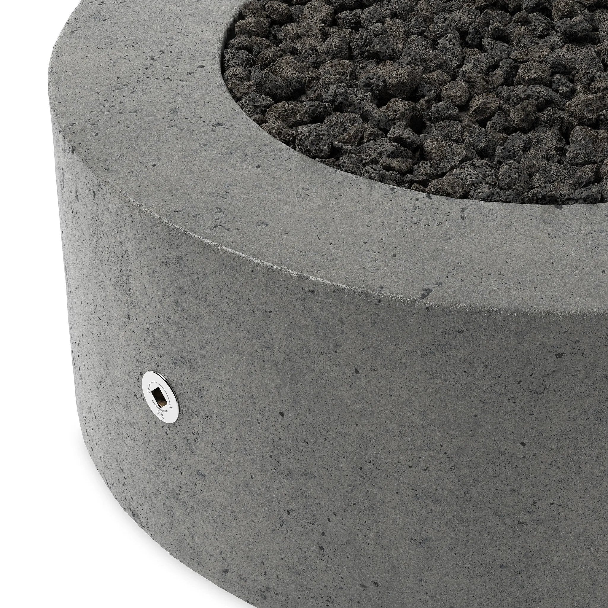 This outdoor fire table is a welcoming centerpiece designed for gathering. Made from glass-reinforced concrete, each piece is naturally finished with deep tones of pewter and dark grey. The monolithic shape is completed with lavastones in the center, bringing together a bold, monochromatic look. Amethyst Home provides interior design, new home construction design consulting, vintage area rugs, and lighting in the Washington metro area.
