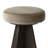 Featuring Damon Sapphire Khaki  Swivel Bar + Counter Stool by Four Hands at Amethyst Home. Large angular panels merge to form a geometrically inspired base in this modern counter stool. The circle metal ring around the base serves as a footrest, while the round upholstered cushion provides comfortable seating. The 360-degree swivel function adds versatili. Amethyst Home provides interior design, new home construction design consulting, vintage area rugs, and lighting in the Los Angeles metro area.