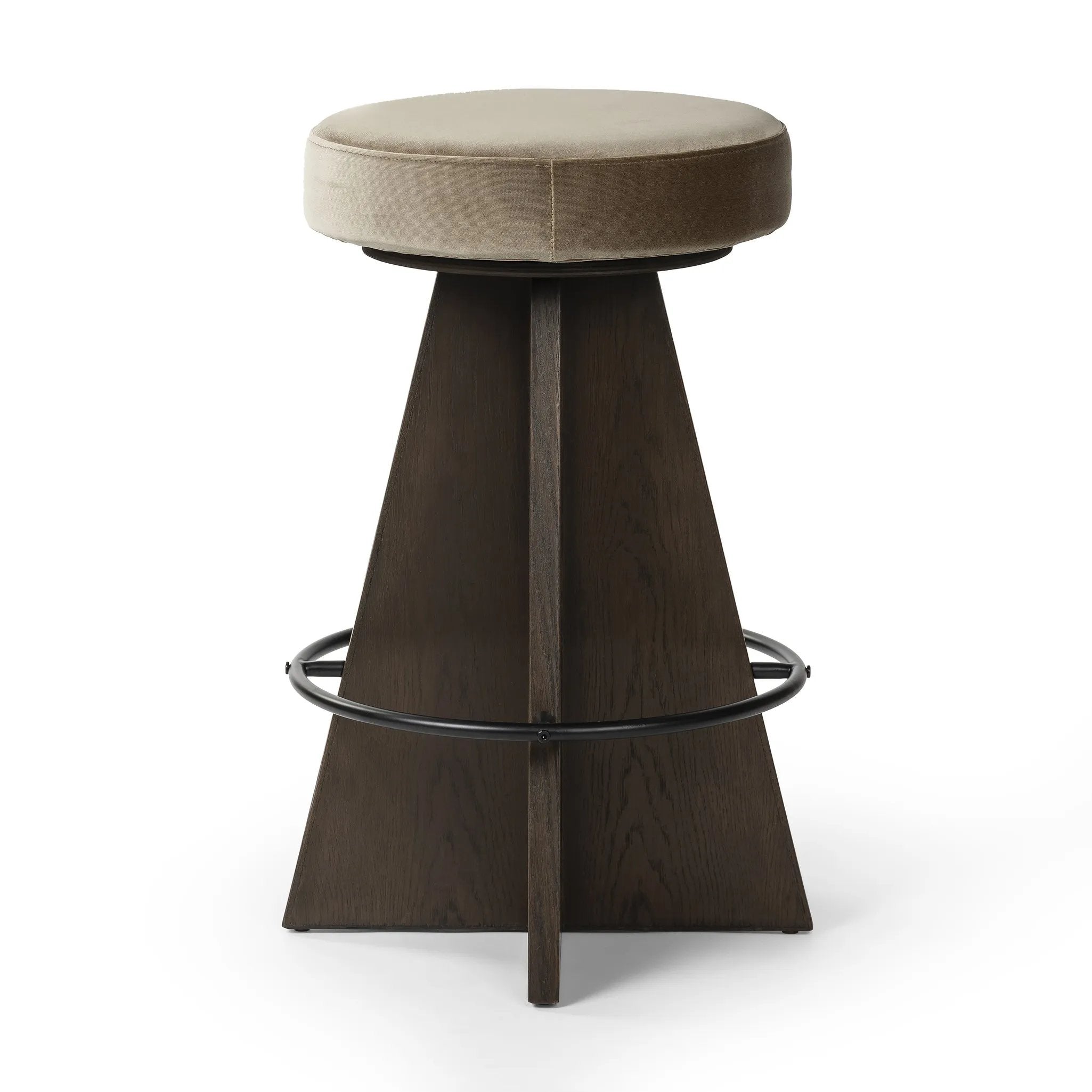 Featuring Damon Sapphire Khaki  Swivel Bar + Counter Stool by Four Hands at Amethyst Home. Large angular panels merge to form a geometrically inspired base in this modern counter stool. The circle metal ring around the base serves as a footrest, while the round upholstered cushion provides comfortable seating. The 360-degree swivel function adds versati. Amethyst Home provides interior design, new home construction design consulting, vintage area rugs, and lighting in the Newport Beach metro area.