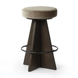 Featuring Damon Sapphire Khaki  Swivel Bar + Counter Stool by Four Hands at Amethyst Home. Large angular panels merge to form a geometrically inspired base in this modern counter stool. The circle metal ring around the base serves as a footrest, while the round upholstered cushion provides comfortable seating. The 360-degree swivel function adds versatility, . Amethyst Home provides interior design, new home construction design consulting, vintage area rugs, and lighting in the Seattle metro area.