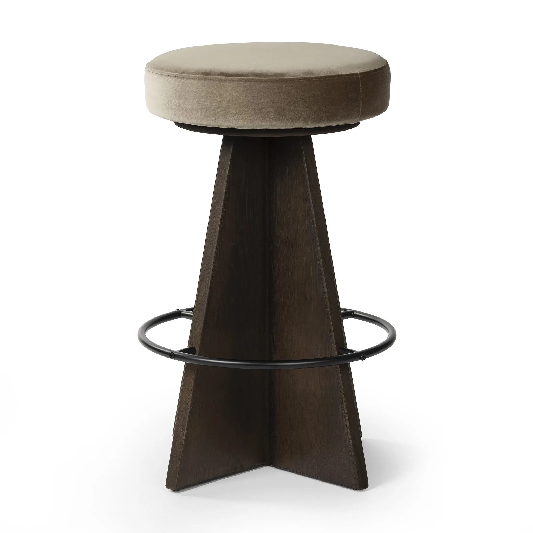 Featuring Damon Sapphire Khaki  Swivel Bar + Counter Stool by Four Hands at Amethyst Home. Large angular panels merge to form a geometrically inspired base in this modern counter stool. The circle metal ring around the base serves as a footrest, while the round upholstered cushion provides comfortable seating. The 360-degree swivel function adds versatility, an. Amethyst Home provides interior design, new home construction design consulting, vintage area rugs, and lighting in the Tampa metro area.