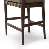 Featuring Dane Broadway Olive Stool by Four Hands at Amethyst Home. Traditional safari styling is brought to modern speed. A solid wood frame features a webbed seating structure that brings a supported, sink-in feel to the entire piece. The upholstered back, strap details and loose cushion are finished in an olive flax/linen-blend fabric. Perfectly sized for t. Amethyst Home provides interior design, new home construction design consulting, vintage area rugs, and lighting in the Dallas metro area.