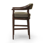 Featuring Dane Broadway Olive Stool by Four Hands at Amethyst Home. Traditional safari styling is brought to modern speed. A solid wood frame features a webbed seating structure that brings a supported, sink-in feel to the entire piece. The upholstered back, strap details and loose cushion are finished in an olive flax/linen-blend fabric. Perfectly size. Amethyst Home provides interior design, new home construction design consulting, vintage area rugs, and lighting in the Winter Garden metro area.