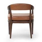 Featuring Dane Sonoma Chestnut Dining Chair by Four Hands at Amethyst Home. Indulge in the refined elegance of the Dane Sonoma Chestnut Dining Chair. With its classic design and luxurious chestnut finish, this dining chair is the perfect addition to any upscale dining room. Its sturdy construction ensures both style and comfort, making every meal a lav. Amethyst Home provides interior design, new home construction design consulting, vintage area rugs, and lighting in the Salt Lake City metro area.