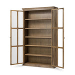 Featuring Dawes Weathered Oak Cabinet by Four Hands at Amethyst Home. Work the timeless charm of a vintage find into your collection. Weathered oak cabinetry features softened mullions and rounded glass panels, with aged bronze barrel hinges and finial detailing. Generous storage and display options  empower you to create a space that tells your story.Overall. Amethyst Home provides interior design, new home construction design consulting, vintage area rugs, and lighting in the Houston metro area.