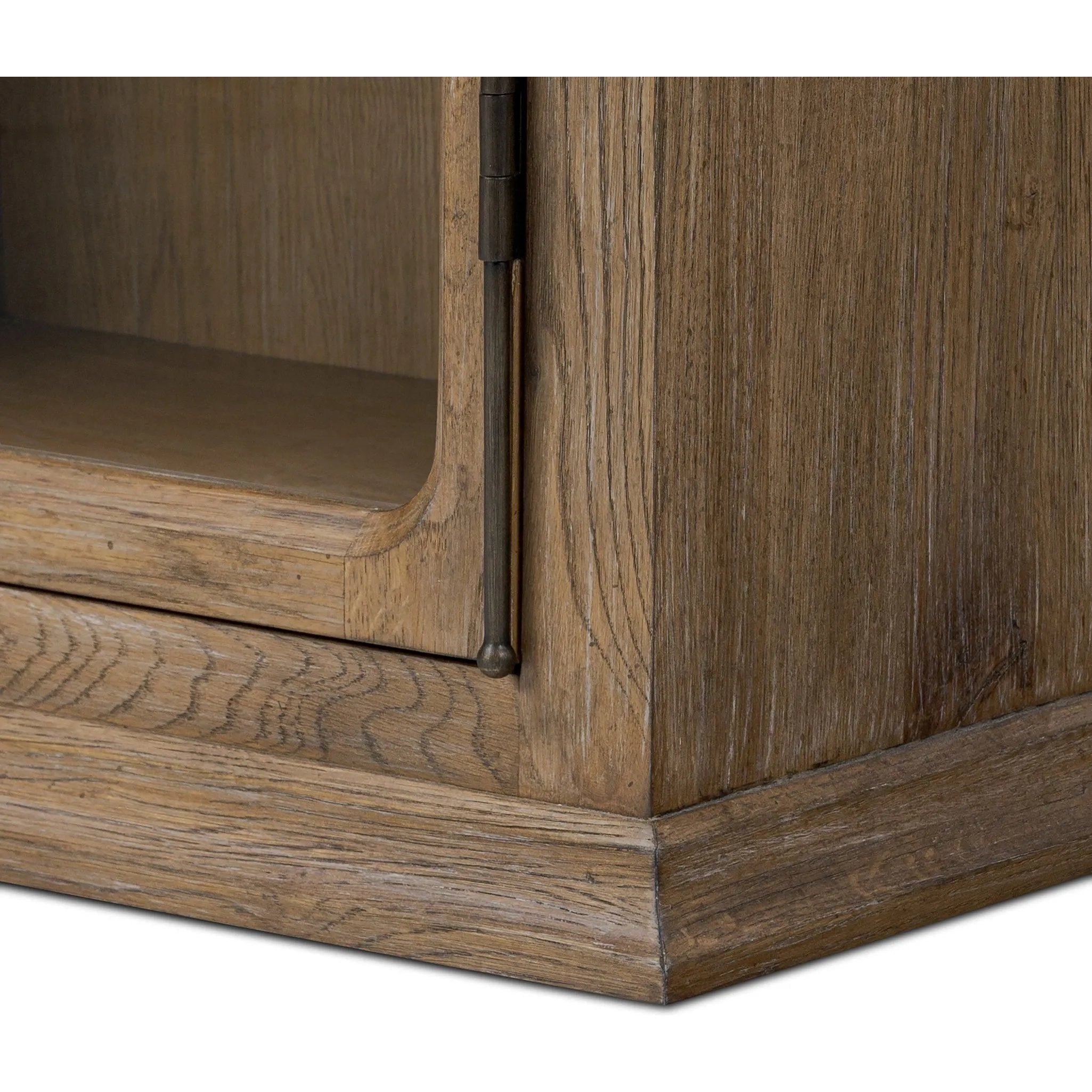 Featuring Dawes Weathered Oak Cabinet by Four Hands at Amethyst Home. Work the timeless charm of a vintage find into your collection. Weathered oak cabinetry features softened mullions and rounded glass panels, with aged bronze barrel hinges and finial detailing. Generous storage and display options  empower you to create a space that tells your story.Overall D. Amethyst Home provides interior design, new home construction design consulting, vintage area rugs, and lighting in the Tampa metro area.