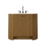 Sleek and softly curved, this pill-shaped bath vanity pairs a monochromatic base with a natural marble top. Complemented by rounded hardware and a set back base board, with adjustable and removable shelves inside for ample storage. Finished with a bath-safe sealant for moisture resistance. Amethyst Home provides interior design, new home construction design consulting, vintage area rugs, and lighting in the Boston metro area.