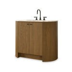Sleek and softly curved, this pill-shaped bath vanity pairs a monochromatic base with a natural marble top. Complemented by rounded hardware and a set back base board, with adjustable and removable shelves inside for ample storage. Finished with a bath-safe sealant for moisture resistance. Amethyst Home provides interior design, new home construction design consulting, vintage area rugs, and lighting in the Laguna Beach metro area.