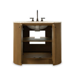 Sleek and softly curved, this pill-shaped bath vanity pairs a monochromatic base with a natural marble top. Complemented by rounded hardware and a set back base board, with adjustable and removable shelves inside for ample storage. Finished with a bath-safe sealant for moisture resistance. Amethyst Home provides interior design, new home construction design consulting, vintage area rugs, and lighting in the Miami metro area.
