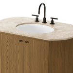 Sleek and softly curved, this pill-shaped bath vanity pairs a monochromatic base with a natural marble top. Complemented by rounded hardware and a set back base board, with adjustable and removable shelves inside for ample storage. Finished with a bath-safe sealant for moisture resistance. Amethyst Home provides interior design, new home construction design consulting, vintage area rugs, and lighting in the Newport Beach metro area.