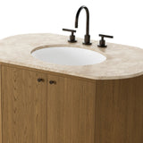 Sleek and softly curved, this pill-shaped bath vanity pairs a monochromatic base with a natural marble top. Complemented by rounded hardware and a set back base board, with adjustable and removable shelves inside for ample storage. Finished with a bath-safe sealant for moisture resistance. Amethyst Home provides interior design, new home construction design consulting, vintage area rugs, and lighting in the Newport Beach metro area.