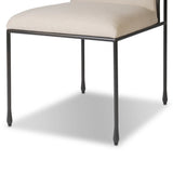 European inspiration gives streamlined character to this high-back metal-framed dining chair. Bent metal detail and tapered f