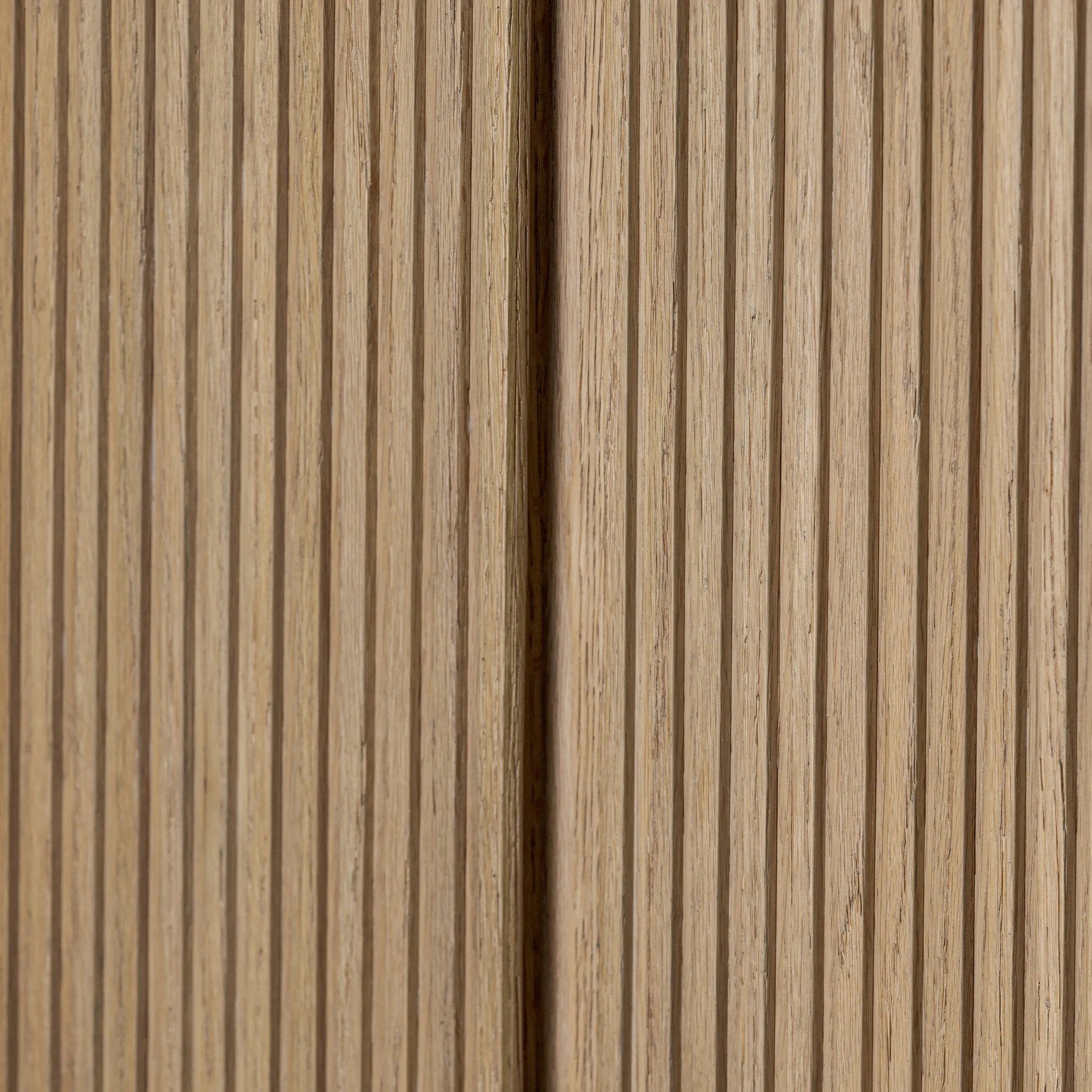 Crafted from light oak with a plinth-style base, rounded sides and linear reeding, this tall cabinet works subtle midcentury vibes into any space. Fully finished interior and shelves for quality detailing inside and out Amethyst Home provides interior design, new home construction design consulting, vintage area rugs, and lighting in the Omaha metro area.