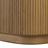 Crafted from desert oak solids and veneers with a plinth-style base, rounded sides and linear reeding, this sideboard exudes midcentury vibes.  Fully finished interior and shelves for quality detailing inside and out Amethyst Home provides interior design, new home construction design consulting, vintage area rugs, and lighting in the Kansas City metro area.