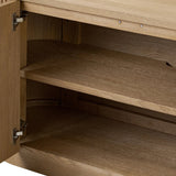 Crafted from desert oak solids and veneers with a plinth-style base, rounded sides and linear reeding, this sideboard exudes midcentury vibes.  Fully finished interior and shelves for quality detailing inside and out Amethyst Home provides interior design, new home construction design consulting, vintage area rugs, and lighting in the Miami metro area.