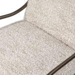 A tribute to traditional artistry and found pieces, this bar stool fluidly combines ash and burnished brass to frame a comfortable S-spring seat. Finished in heavy boucle-like upholstery that features a subtle linear pattern for added depth — creating a luxe, inviting feel. A design collaboration by Amber Lewis and Four Hands. Amethyst Home provides interior design, new home construction design consulting, vintage area rugs, and lighting in the San Diego metro area.