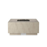 This outdoor fire table is a welcoming centerpiece designed for gathering. Made from glass-reinforced concrete, each piece is naturally finished with subtle tones of grey and cream. The monolithic shape is completed with lavastones in the center, bringing together a bold, monochromatic look. Amethyst Home provides interior design, new home construction design consulting, vintage area rugs, and lighting in the Alpharetta metro area.