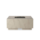 This outdoor fire table is a welcoming centerpiece designed for gathering. Made from glass-reinforced concrete, each piece is naturally finished with subtle tones of grey and cream. The monolithic shape is completed with lavastones in the center, bringing together a bold, monochromatic look. Amethyst Home provides interior design, new home construction design consulting, vintage area rugs, and lighting in the Alpharetta metro area.