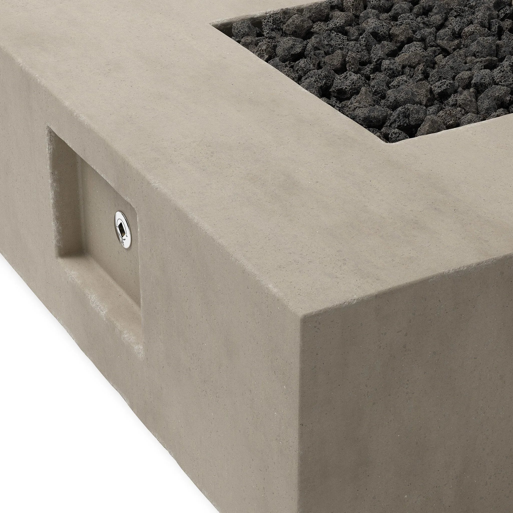 This outdoor fire table is a welcoming centerpiece designed for gathering. Made from glass-reinforced concrete, each piece is naturally finished with subtle tones of grey and cream. The monolithic shape is completed with lavastones in the center, bringing together a bold, monochromatic look. Amethyst Home provides interior design, new home construction design consulting, vintage area rugs, and lighting in the Omaha metro area.